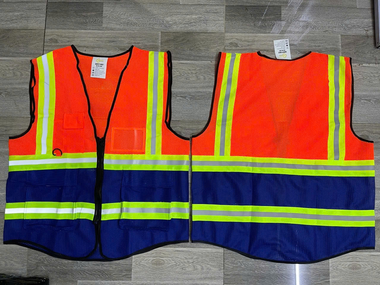 Áo lưới phản quang vàng phối xanh dương đẹp từ chất liệu đẹp đến giá cả mang độ an toàn cao khi sử dụng